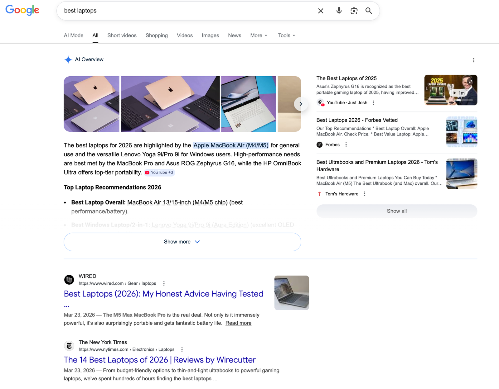 The search results for "best laptops" include an AI Overview and product comparisons.